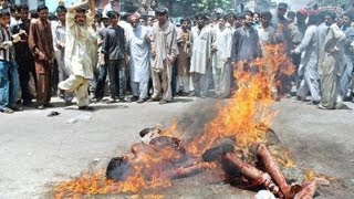 MUSLIMS BURNING CHRISTIANS
